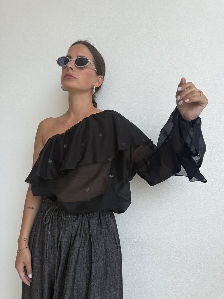 Blusa monospalla 